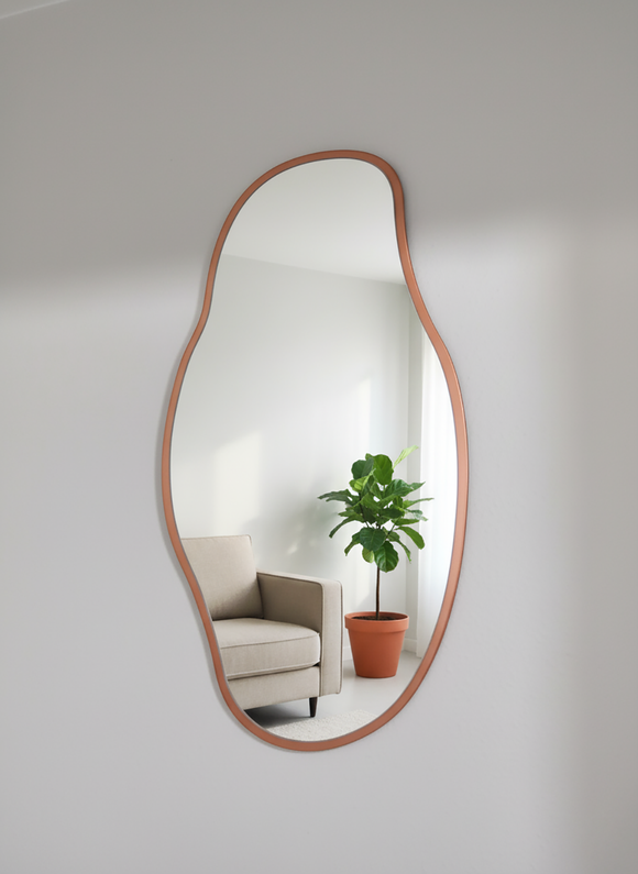 designerskie lustro ścienne z miedzianą ramą